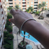 Don't Tie Me Down Rope Bangle with Starfish Charm
